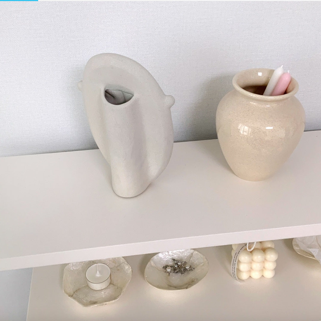 Abstract face vase